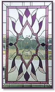 Church door window - STAINED GLASS WINDOWS,  Chattanooga, Tennessee, specializes in the custom design and fabrication of stained and leaded glass. Each stained glass creation is diverse and unique.
Providing precision craftsmanship across the United States,  windows consist of a spectrum of colors as well as a variety of shapes and textures. Each original design is sure to complement any architecture - be it your home, business or church!